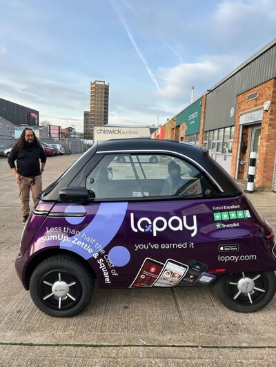 An image of the side of the Lopay car showing the vehicle graphics and wraps